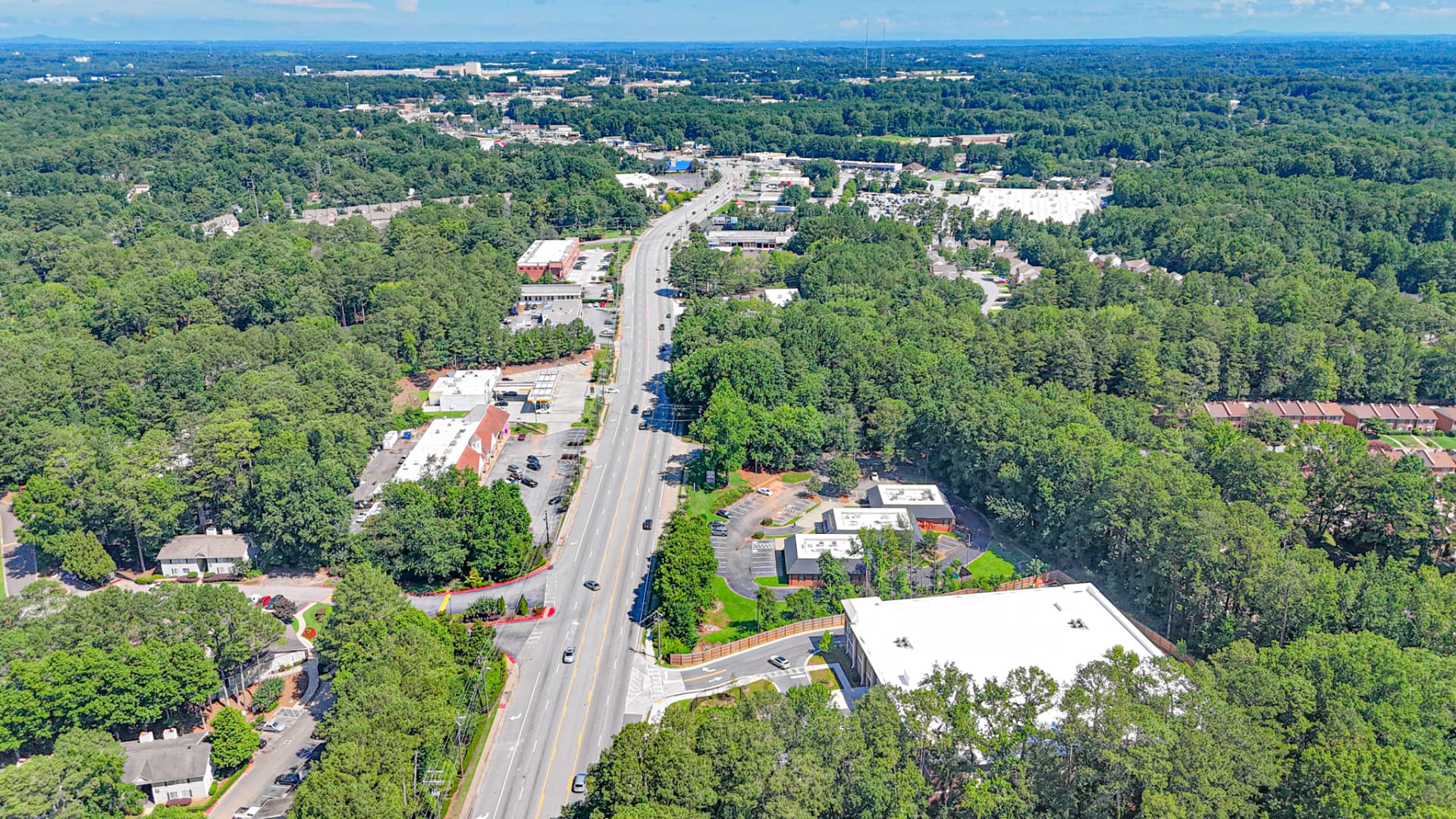 Aerial view of the Jimmy Carter Boulevard corridor and the subject property